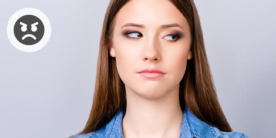 Beautiful woman glancing sideways suspiciously.