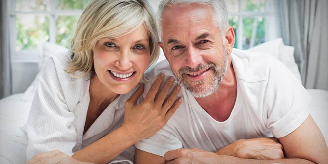 Mature Swinger Couple Looking Connected And Happy