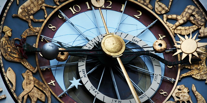 Ornate clock with the astrological symbols