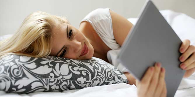 Woman talking to her long distance partner using a tablet 