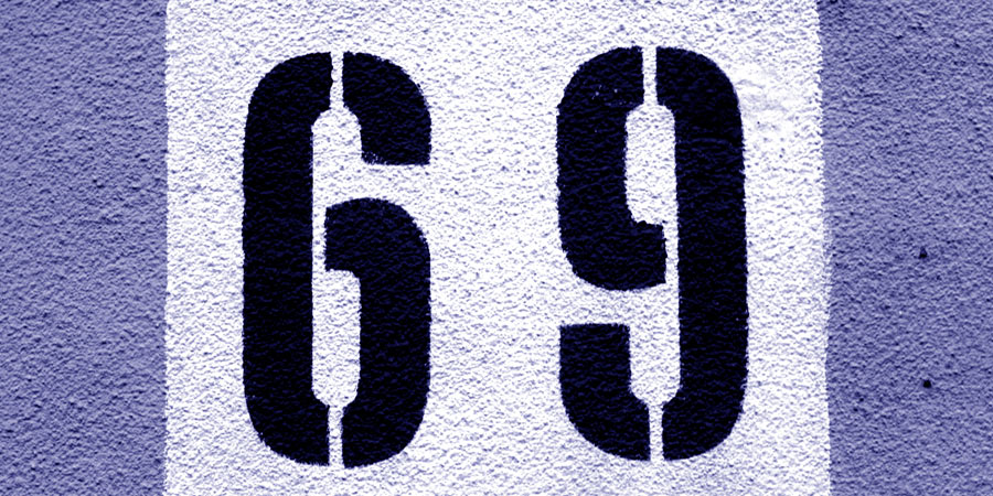 The number sixty nine painted onto a white surface
